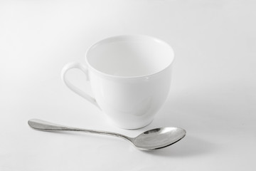 Cup of coffee and spoon