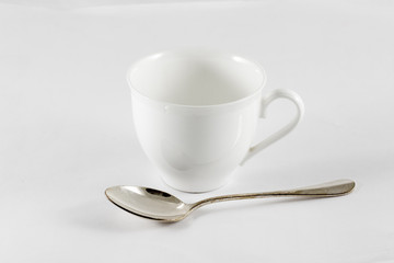 Cup of coffee and spoon