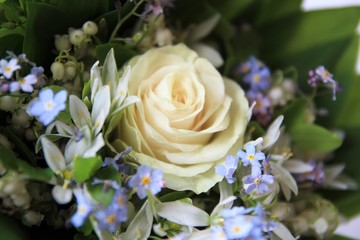 Bridal bouquet of white rose in bright colors