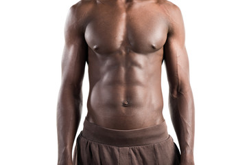 Fototapeta na wymiar Strong black man posing in studio