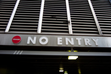 low angle view of no entry sign on building exterior.
