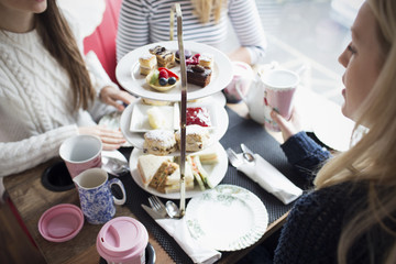 Group Of Young Female Friends Meeting In Tea Bus