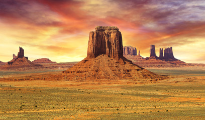 sunset on the wild landscape of monument valley