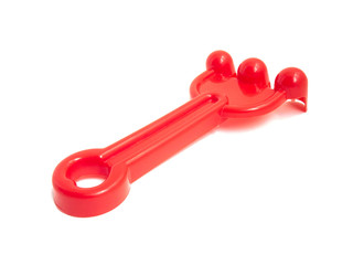 Red fork beach toys isolated on white background. Color toys. Beach toys. Isolated toys.Children toys.