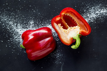 cut red pepper and salt on the table