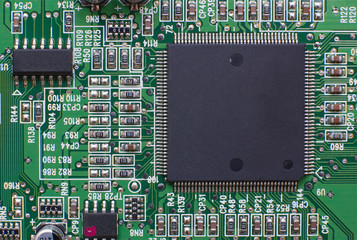 Printed circuit board with electronic components. Computer and networking communication technology concept. 