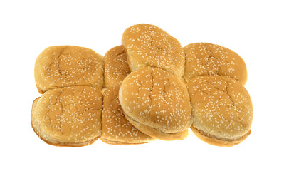 Sesame seed hamburger buns in a group isolated on a white background