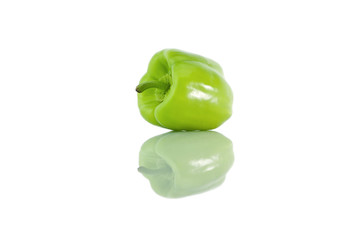 One green pepper on a white background
