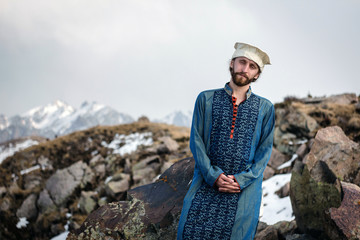 portrait of beard man in national clothes