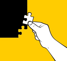 Hand placing puzzle piece