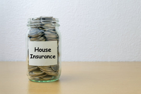 Money saving for house Insurance in the glass bottle