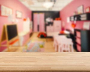 wooden counter with bedroom background