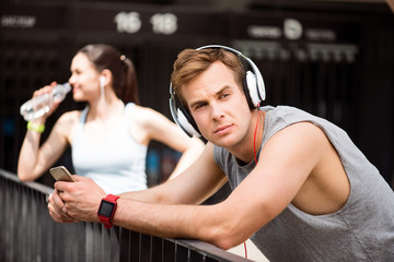 Man listening to music through a headset