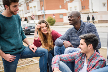 Group of friends having fun together outdoors