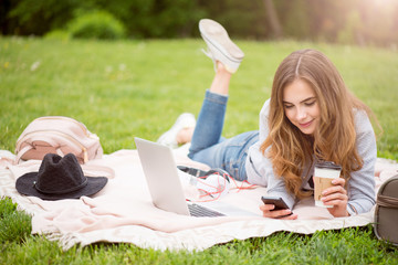 Modern young woman in a park