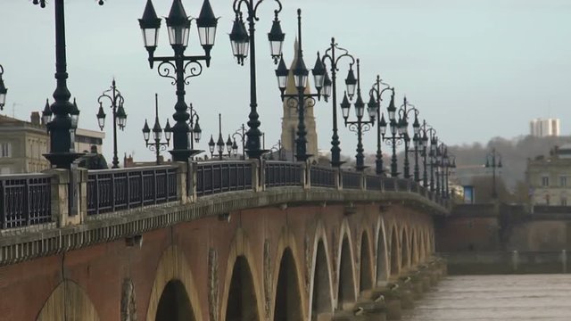 Gothic streetlights on Aquitaine bridge in Bordeaux, France, quiet European city