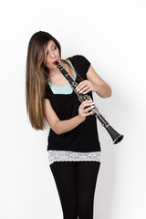 woman play clarinet