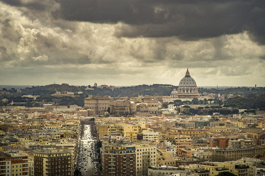 A cityscape view of Rome, with St. Peter's Basilica and The Vatican from the top of Monte Mario