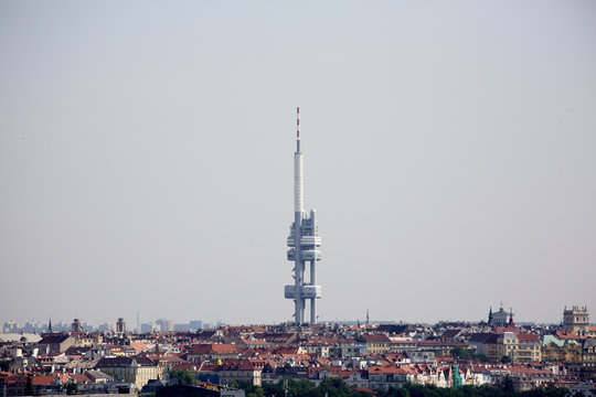 Transmission tower. Tower of Zizkov. Tv tower. Futuristic technology tower in Prague. Famous cechia tower with old town. Technology tower.