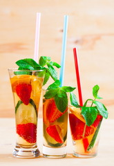 Drink. Pimms, beige wooden background