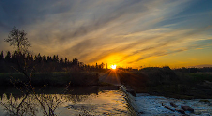 River on sunset background
