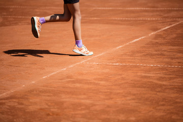 Tennis game on clay court