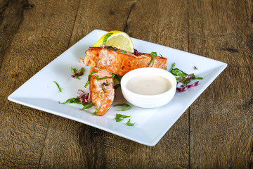 Baked salmon with sauce