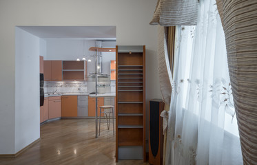 Kitchen in the interior of the studio apartments.
