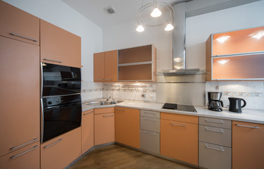 Fototapeta premium Kitchen in the interior of the studio apartments.