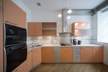 Kitchen in the interior of the studio apartments.