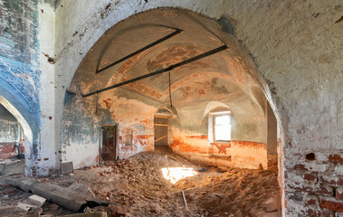 Brick vault apse with christian painted ceiling in an abandoned