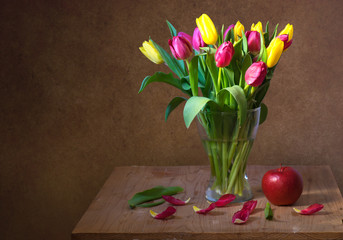 Still life with red and yellow tulips