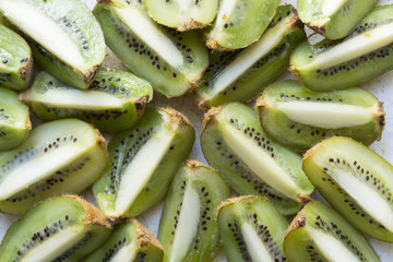 Fresh organic Kiwi Fruit Slices arranged showing the pips & structure