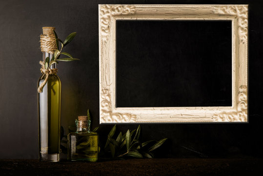 Extra olive oi bottlesl and old empty frame