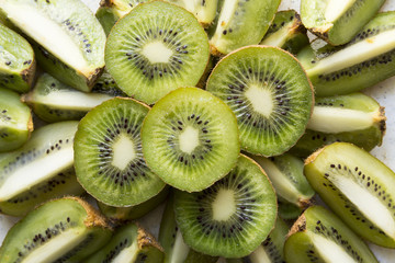 Fresh organic Kiwi Fruit Slices arranged showing the pips & structure