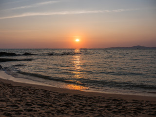 Fototapeta na wymiar Sunset on beach