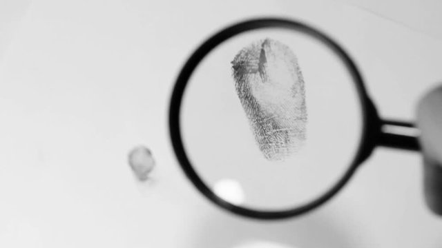Investigating fingerprint magnifier close up 4