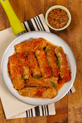 Stuffed Cabbage with tomato sauce. Selective focus.