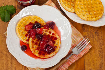 Waffles with Fresh Strawberry Syrup. Selective focus.