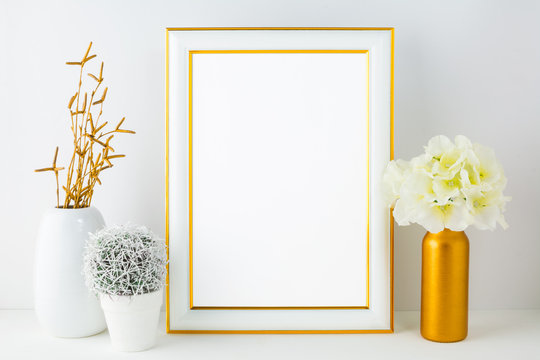 White frame mockup with small cactus