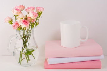 Coffee mug mockup with pink roses