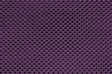 Purple and violet fishnet cloth material texture background. Nylon texture. Nylon fabric. Nylon bag for background with copy space for text or image.