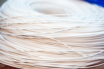 close up a roll of white cable