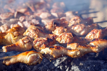 Cooking meat on the fire.