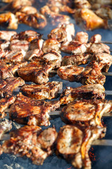 Cooking meat on the fire.