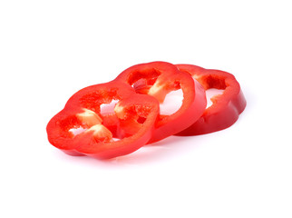 Fresh red pepper slices isolated on white
