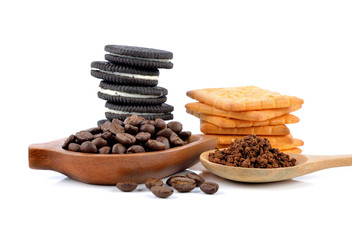 coffee beans, cookies and cracker on white