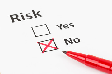 Risk assessment check box and pen