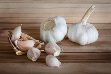Garlic on wood background