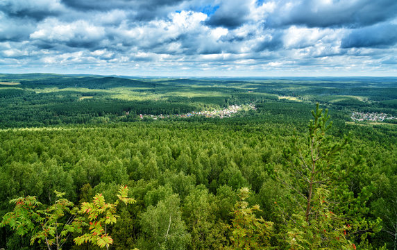 View of forest, mountains, fields, cottages from Lipovaya Mount
